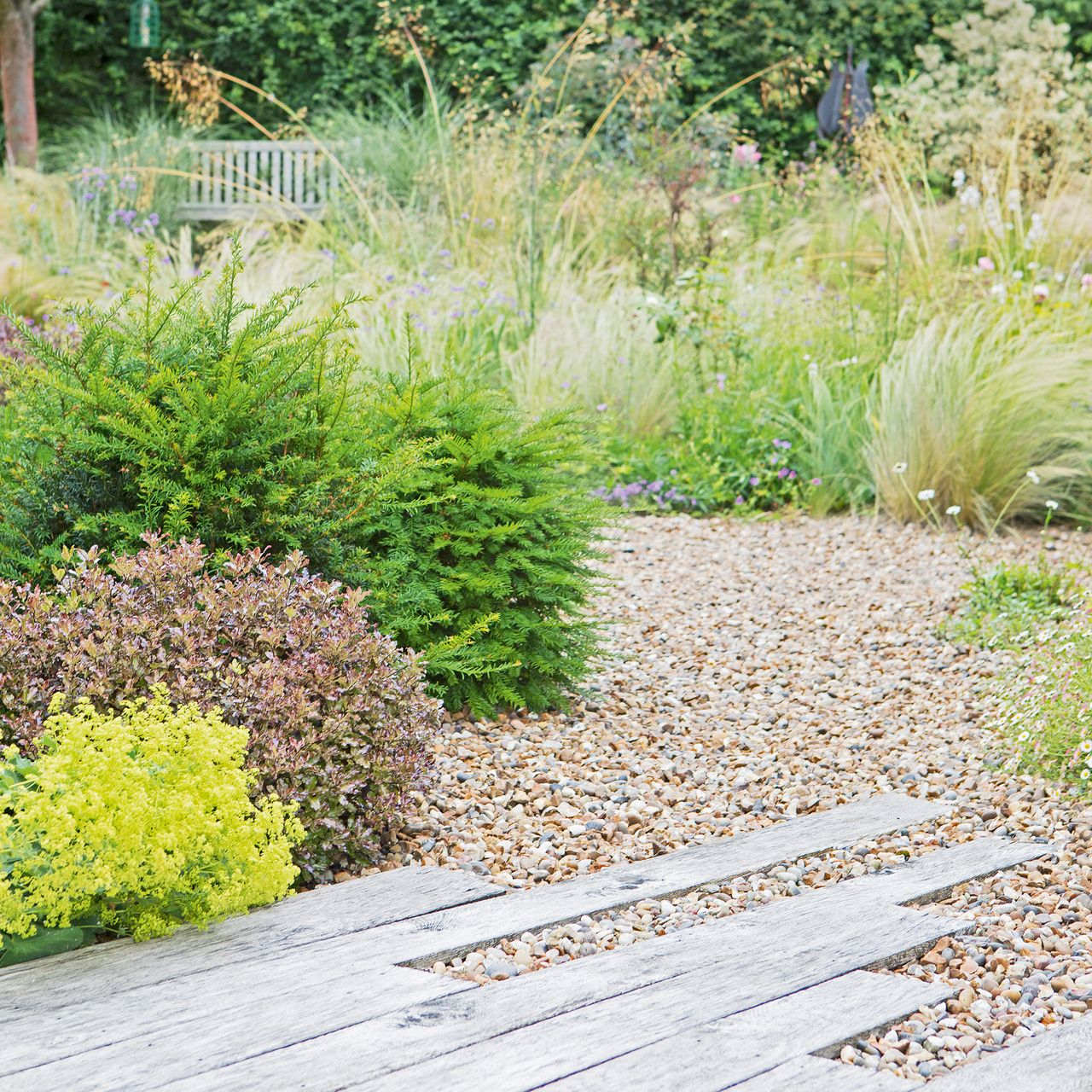 10 Gravel Garden Ideas For An Easy, Low-Maintenance Style | Ideal Home pertaining to How to Stop Erosion on Slopes Using Decorative Stone and Mulch