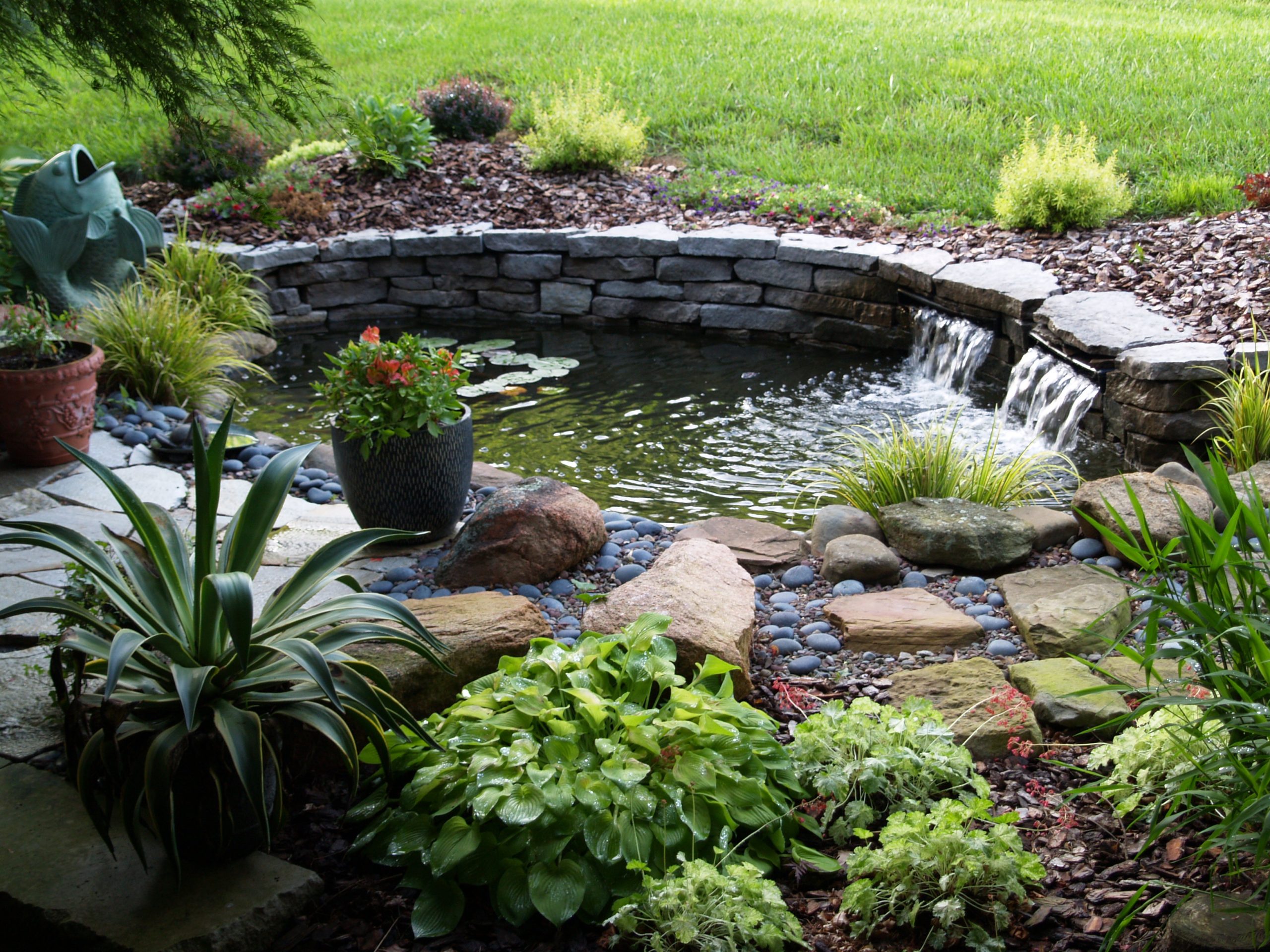 How To Build A Pond In Your Garden | Hirerush Blog inside Pond Landscaping