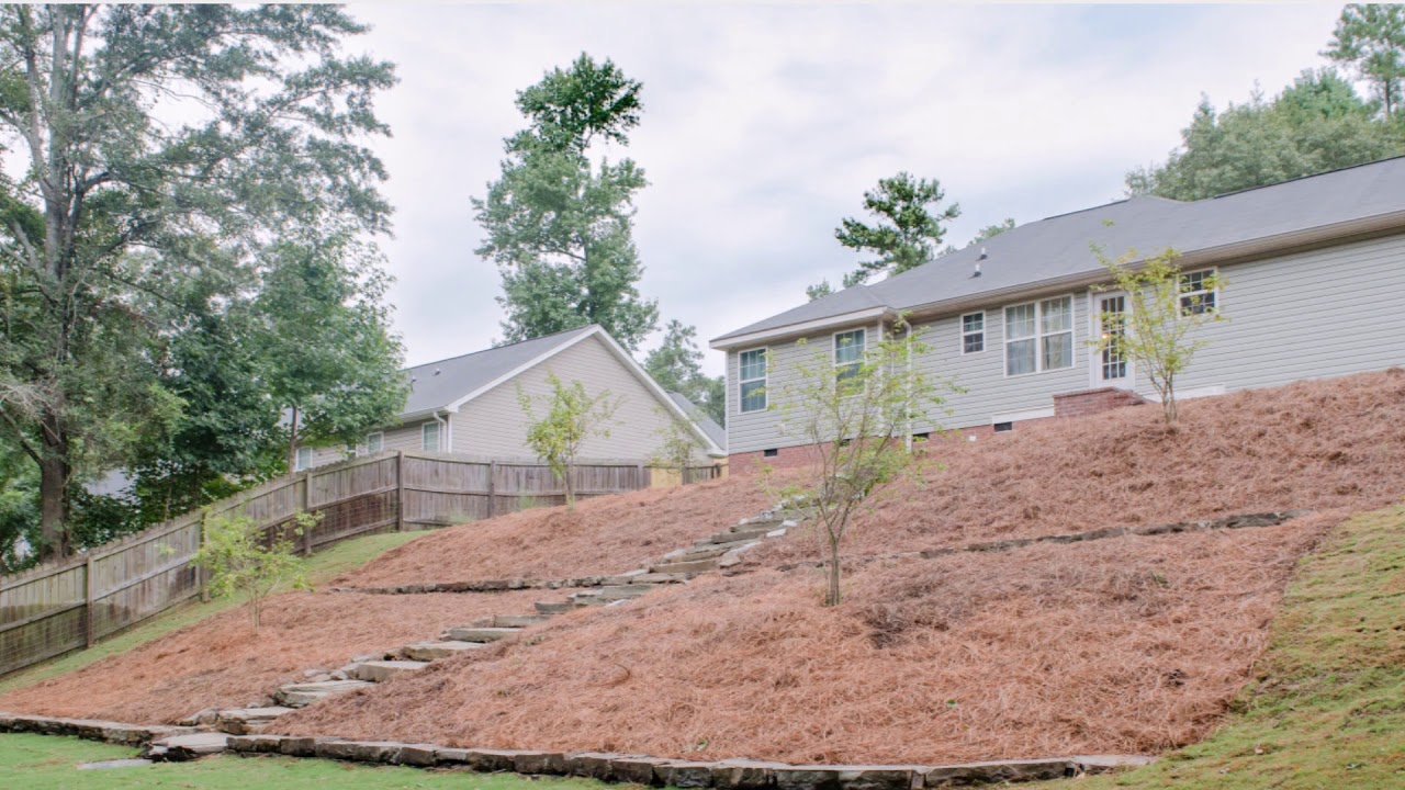Solutions For A Severely Sloped Backyard - Youtube inside Real Ways Homeowners Are Saving Their Sloped Yards from Severe Soil Loss in 2026
