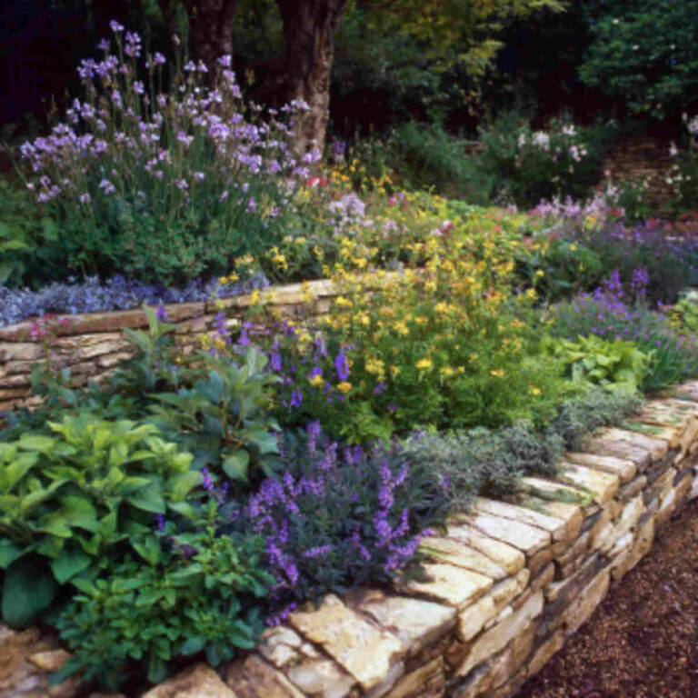 21 Simple Raised Garden Ideas With Stone Borders That Anyone Can Try intended for Creative ways to use stone borders and perennial flowers around your mailbox