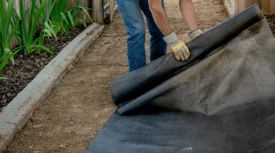 How To Use Garden Fabric Or Covers within How To Install Landscape Fabric Weed Barrier