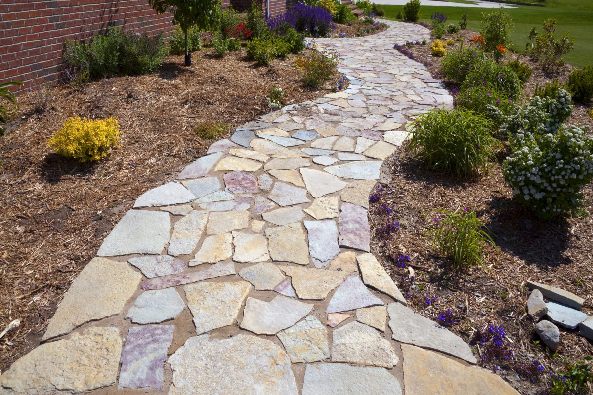 Can You Lay Flagstone On Dirt? [With Tips For Laying On Uneven Ground ... regarding Flagstone Patio Ideas Diy Backyard